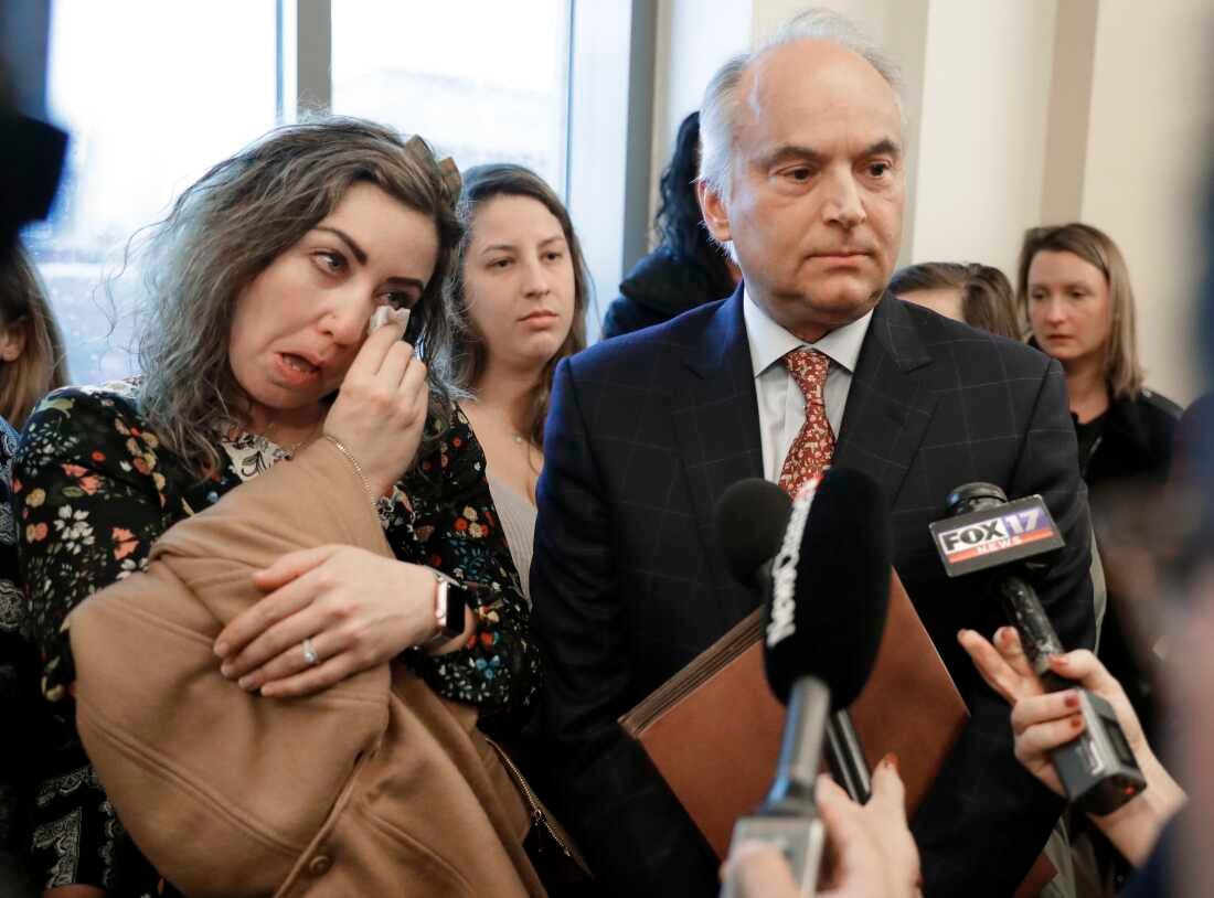 RaDonda Vaught and her attorney, Peter Strianse, talk with reporters after a court hearing on Feb. 20, 2019, in Nashville, Tenn. RaDonda Vaught and her attorney, Peter Strianse, talk with reporters after a court hearing on Feb. 20, 2019, in Nashville, Tenn.