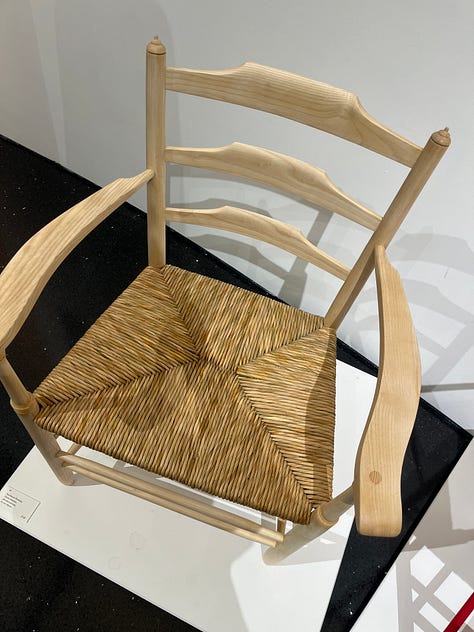 1. Marchmont Workshop rush and hardwood chair; 2. Studio Amos basket; 3. Jessica Watson Brown tanned rawhide deerskin on frame, with Geoff Hannis steam bent turned wood candlesticks.