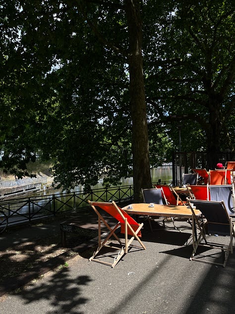 Château des Ducs de Bretagne and the city around the fortress, Jardin des Plantes, the Jean Jullien green line installation and the lively Café de l'Orangerie, former LU biscuit factory Le Lieu Unique and its bookshop and outdoor area by the river