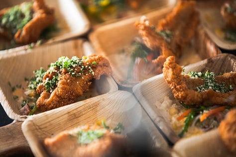 “Chefs from Aramark Collegiate Hospitality showcasing coastal-inspired dishes at the NC Seafood Festival 2025 — including seafood risotto, crab gumbo, and fried shrimp tacos — during live cooking demos and tastings with festival guests.”