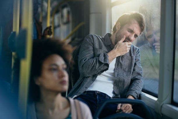 Tired Man Yawning While Commuting By Public Transport Stock Photo -  Download Image Now - iStock