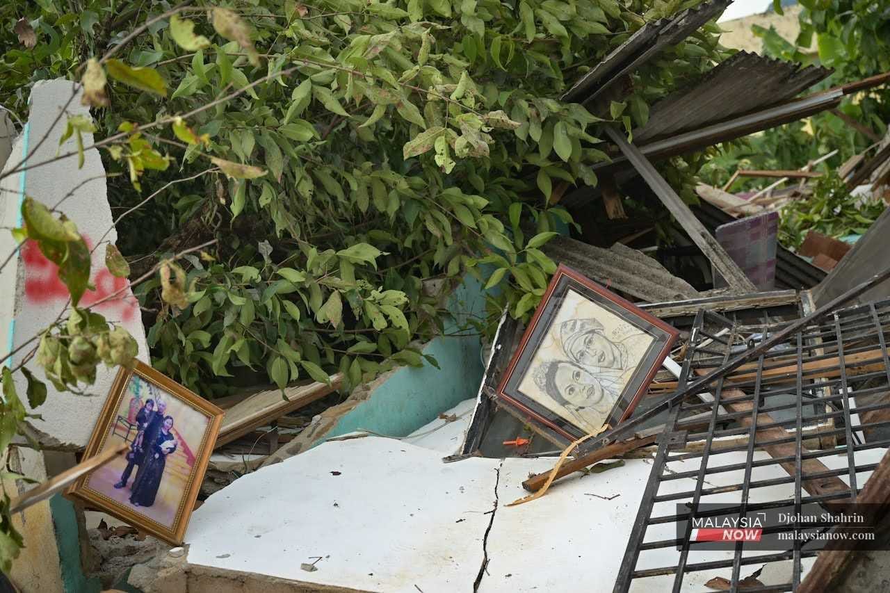 SriMakmur_2_mnow_29052024 Family portraits lie amid the rubble of houses demolished by the state government in Kampung Sri Makmur, Gombak.