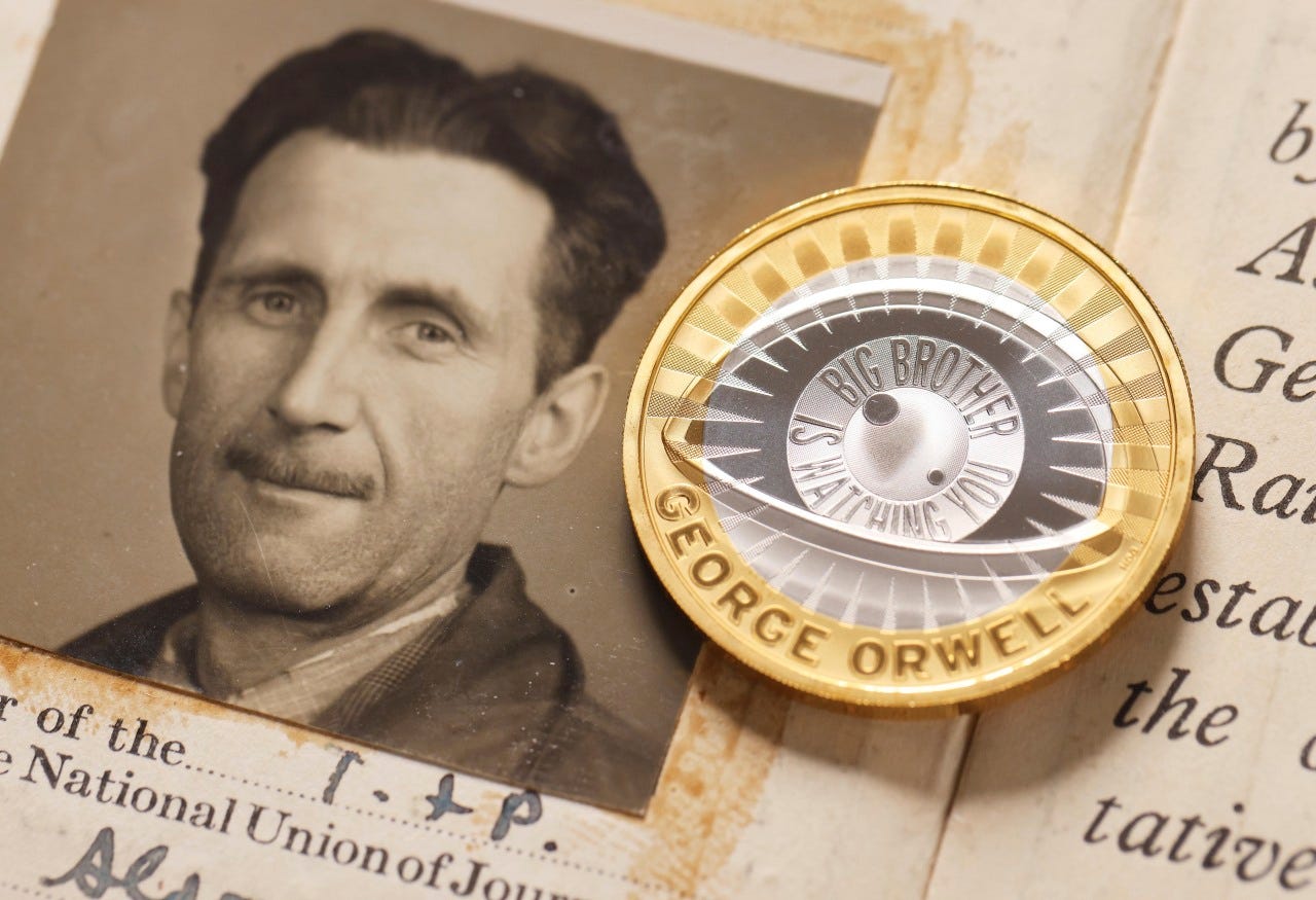 A portrait of George Orwell and a new £2 coin. 