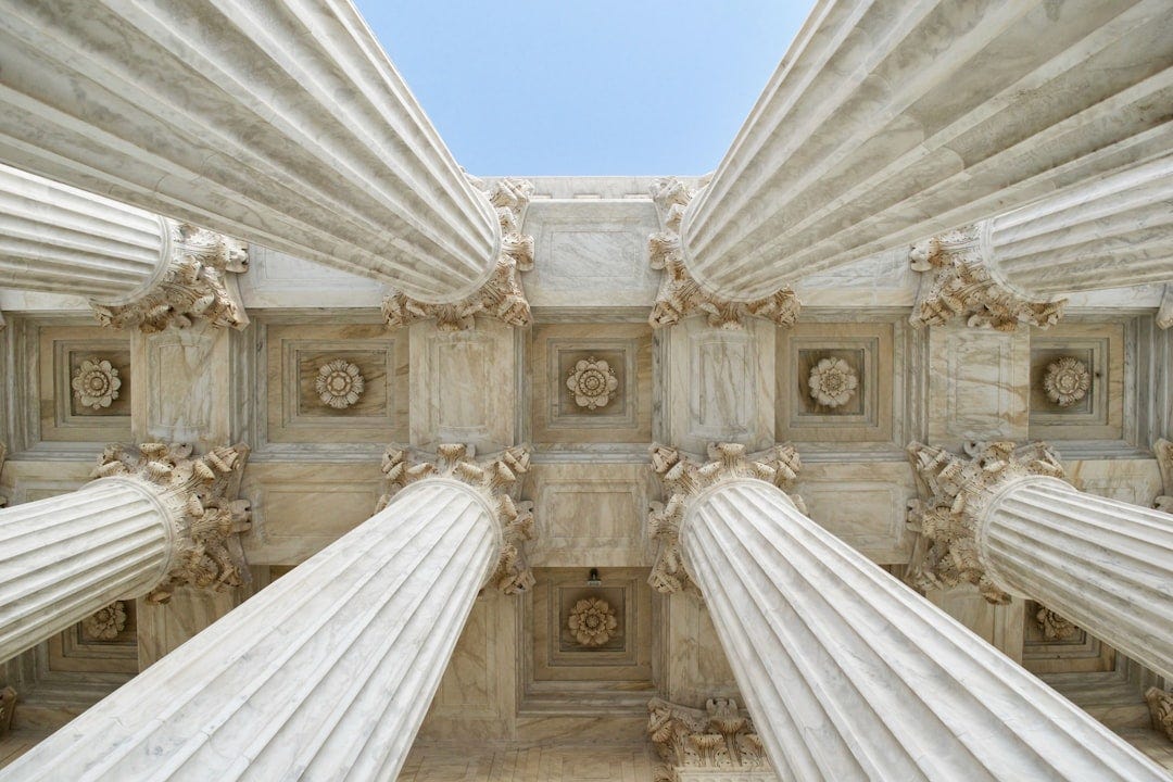 gray stone columns worm's-eye view photo gray stone columns worm's-eye view photo