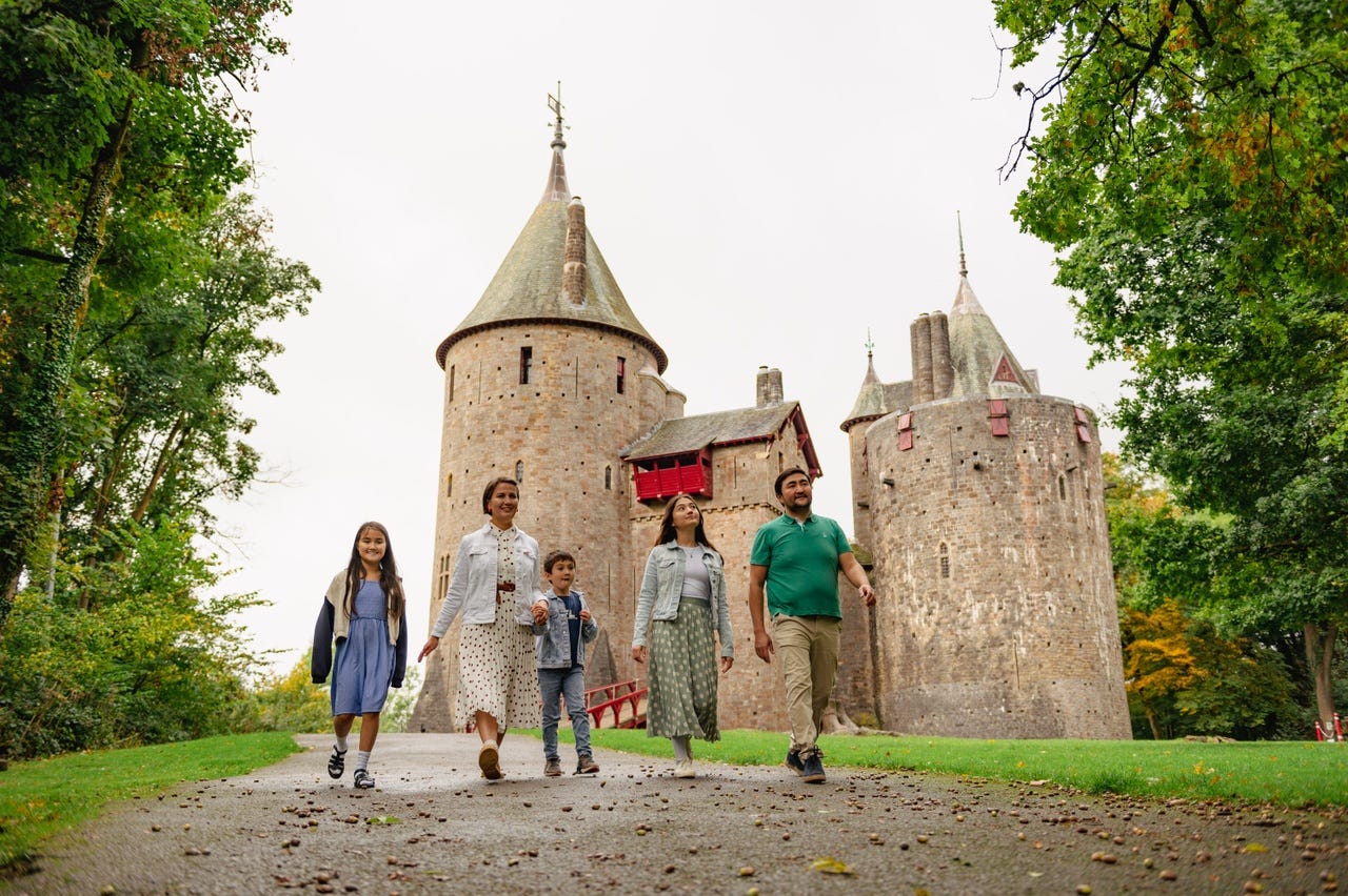 Family outside the front of Castell Coch