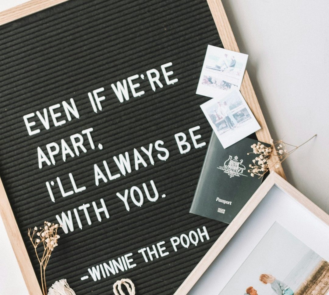 man and woman sitting photo