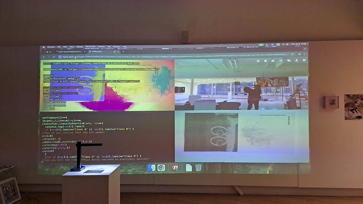 Images of an informal classroom setting where artsist look at creating zines nd computer graphics on screen 