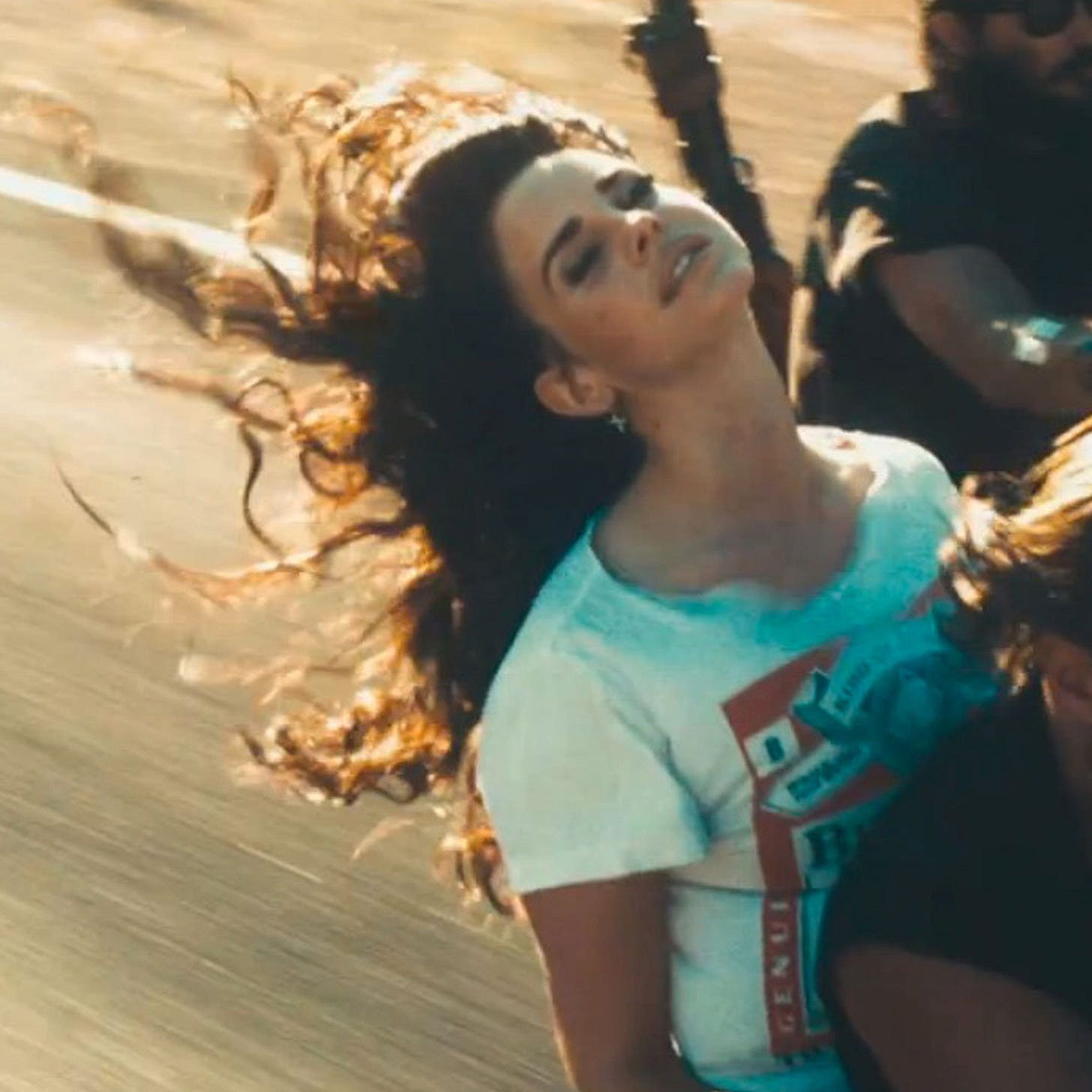 Lana Del Rey debuts new look by swapping beehive for curls in her new video  for song Ride | ELLE UK