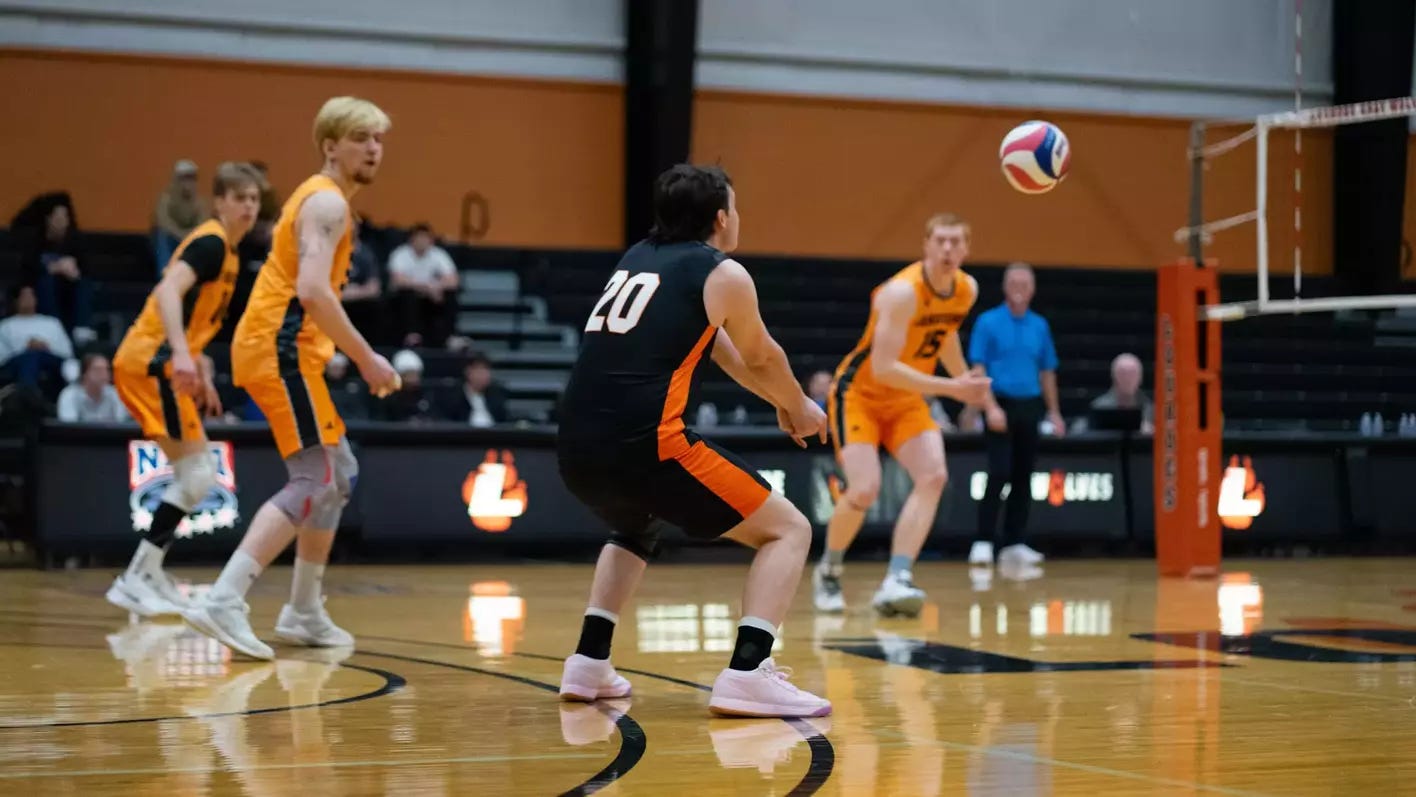 Ethan Hoffert digs ball Ethan Hoffert digs ball