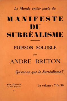 Orange paper with text printed in French and titled 'Manifeste du Surréalisme'