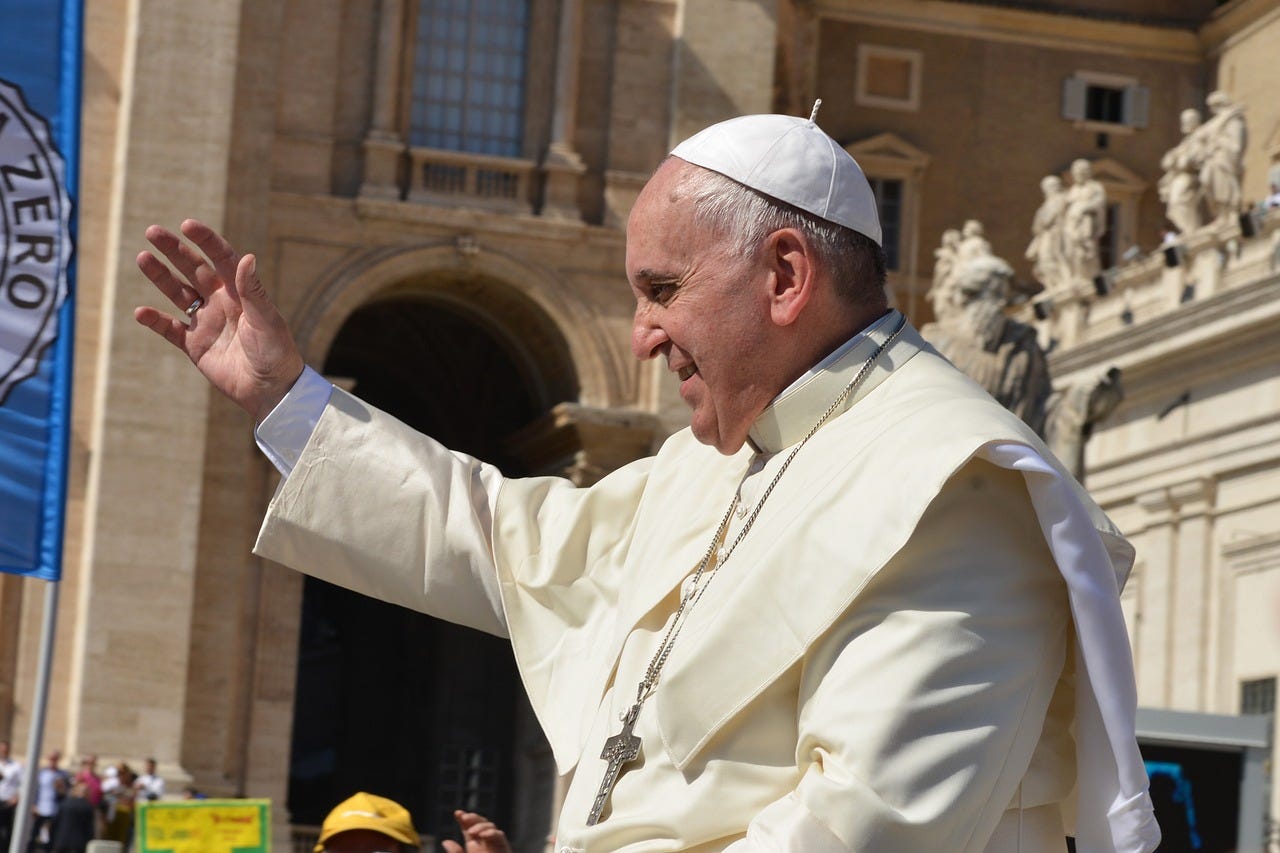 Pope Francis with crowds at the Vatican