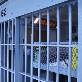 Gov. Larry Rhoden announces parole reforms in wake of police officer shooting