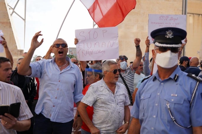 Raymond Ambrogio, left, a former police sergeant who led the chants at the counter-protest to the Justice For Lassana memorial Raymond Ambrogio, left, a former police sergeant who led the chants at the counter-protest to the Justice For Lassana memorial