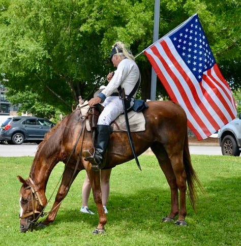 photo gallery of images from the 6/14 protest in Rock Hill showing signs and people