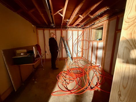 Mosaic of images showing hydronic radiant floor heating being installed.