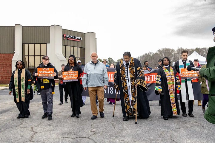 Repairers of the Breach marching o fight back against the new racist congressional map passed by the North Carolina General Assembly.