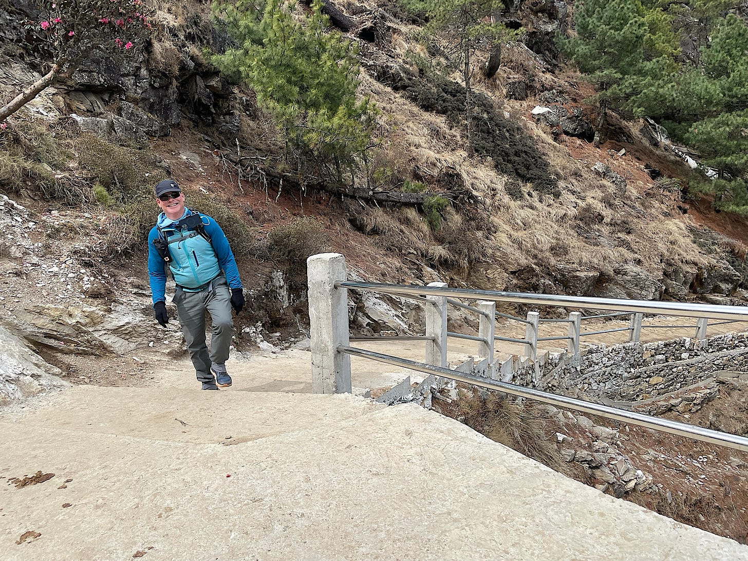 The stairs right after the bridge are new concrete structures.