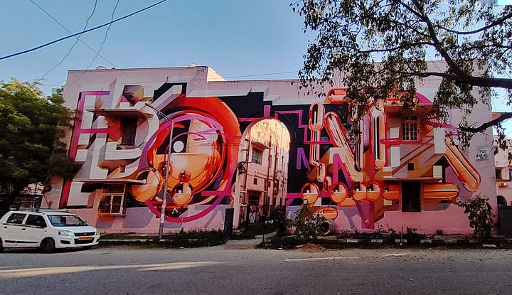 4 images of colourful murals of walls in Delhi