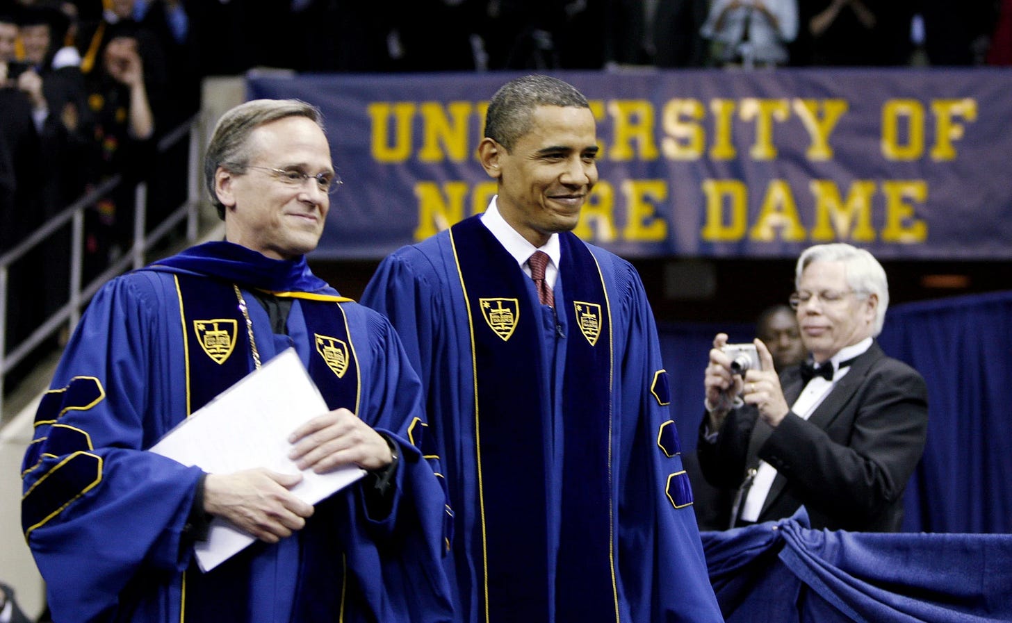 Rev. John Jenkins and President Barack Obama walk in for Notre Dame’s 2009 commencement Rev. John Jenkins and President Barack Obama walk in for Notre Dame’s 2009 commencement