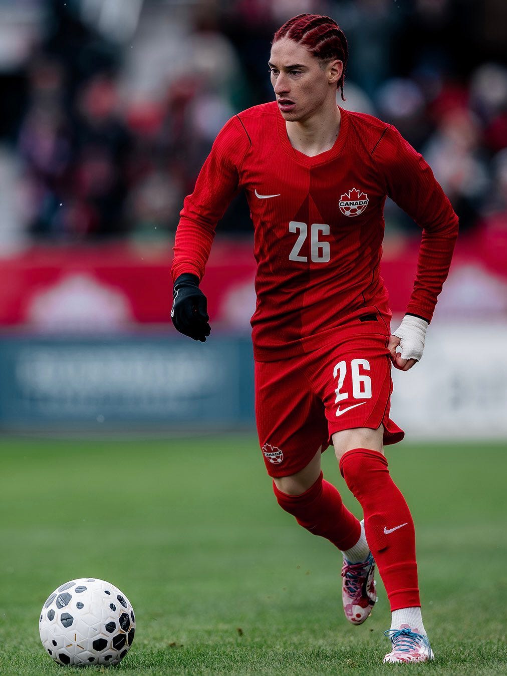 Marcelo Flores gets on the ball during his debut for the Canadian national team