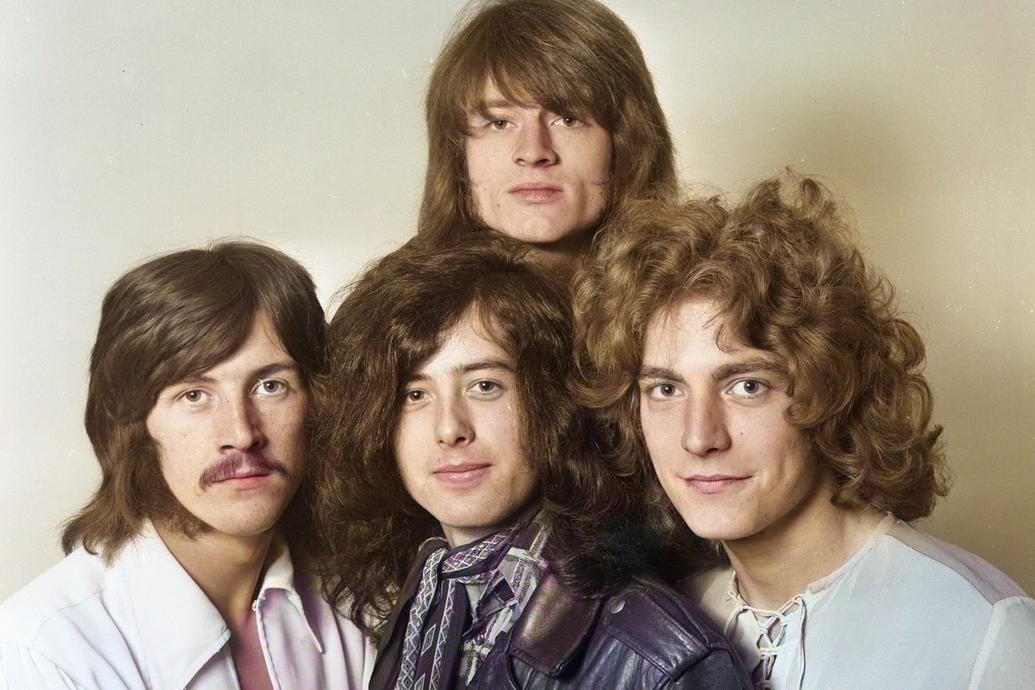(EDITORS NOTE: Image has been digitally converted to colour from a black and white analogue original.) English rock band Led Zeppelin, studio portrait in London, December 1968. L-R John Bonham, Jimmy Page, John Paul Jones, Robert Plant. (Photo by Dick Barnatt/Redferns) (EDITORS NOTE: Image has been digitally converted to colour from a black and white analogue original.) English rock band Led Zeppelin, studio portrait in London, December 1968. L-R John Bonham, Jimmy Page, John Paul Jones, Robert Plant. (Photo by Dick Barnatt/Redferns)