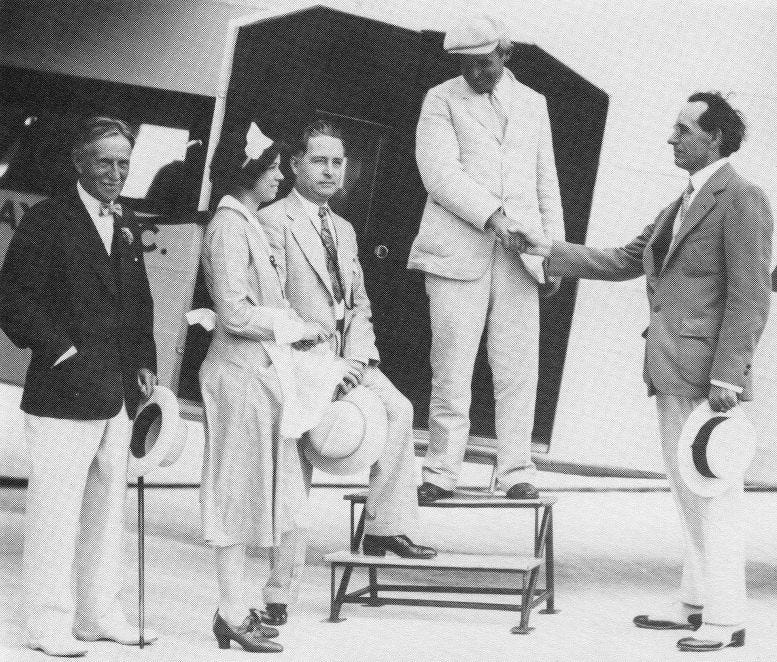 Everest G. Sewell greeting Will Rogers in 1931.