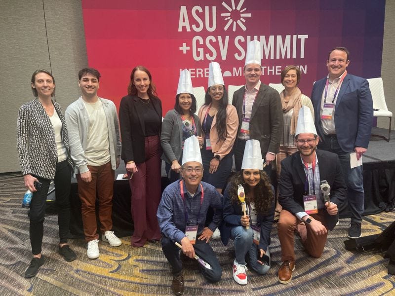 a group of people posing for a photo