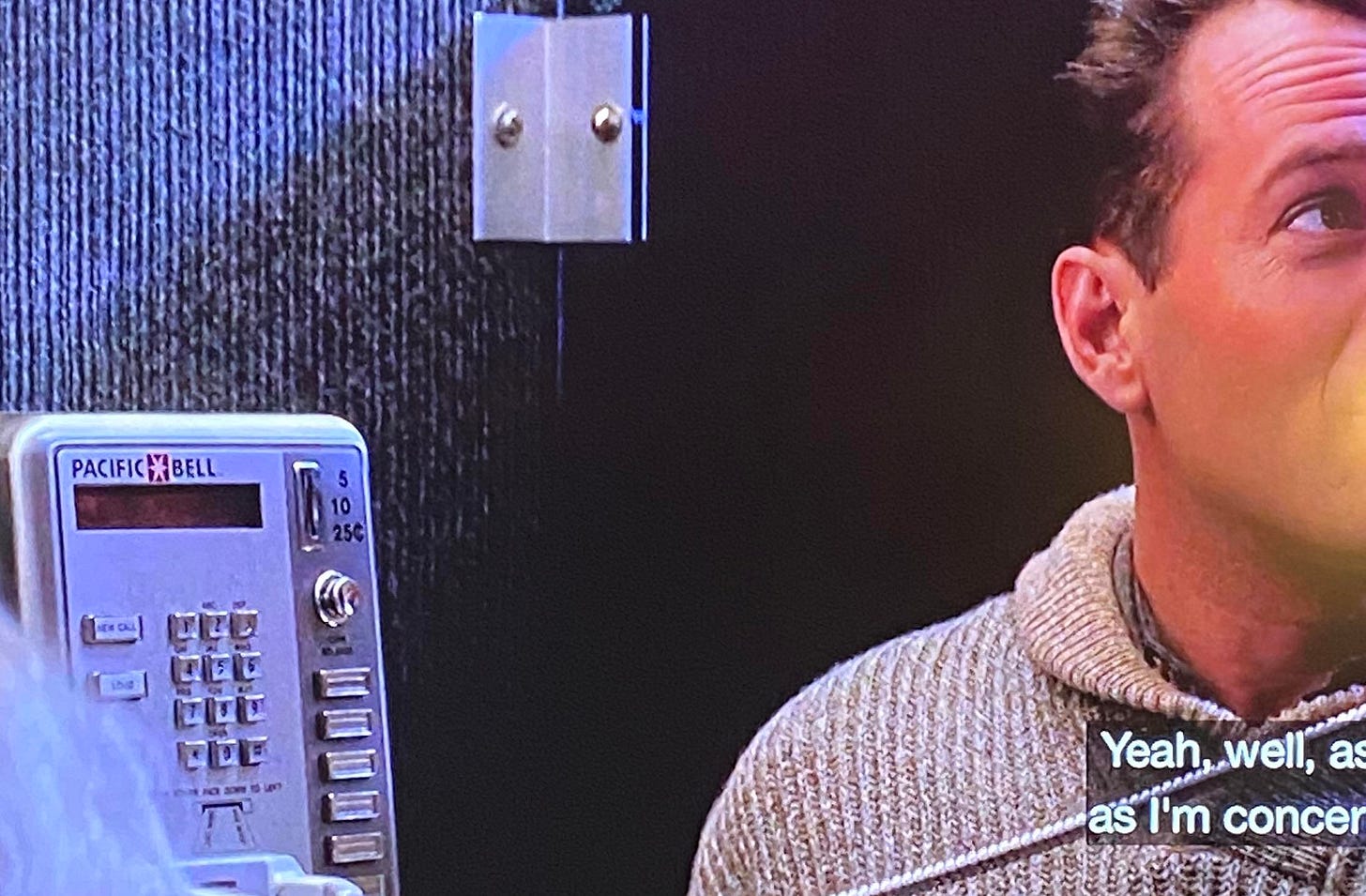 In Die Hard 2 (1990) the pay phone that John McClane is using is a Pacific  Bell telephone, but if he was at Dulles Airport in Washington D.C. the pay  phones would