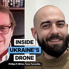 Phillips talks with Taras Tymochko of CBA