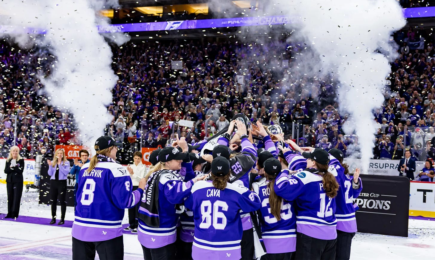 Frost players with the Walter Cup