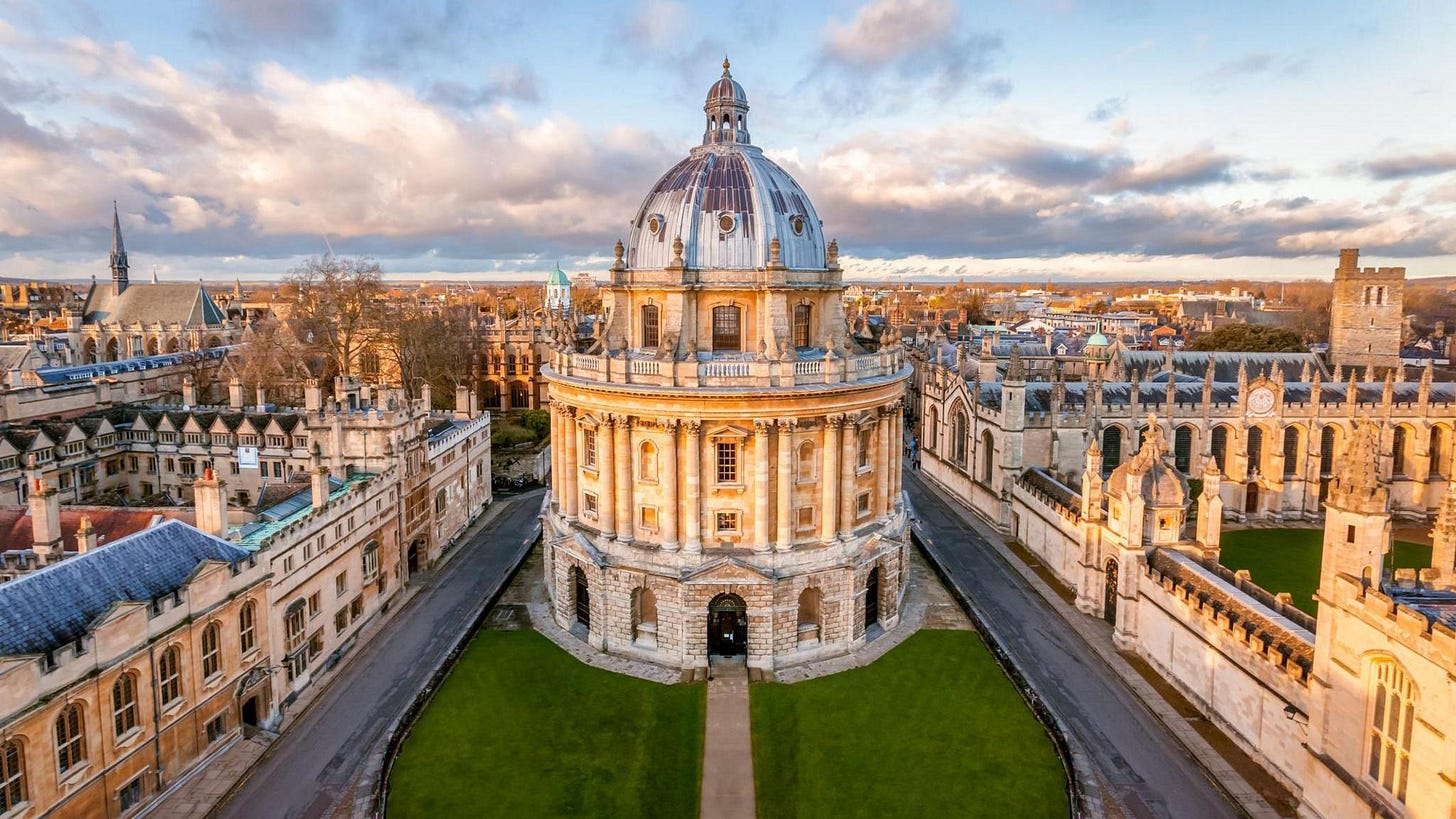 An aerial view of the Radcliffe Camera in Oxford a palladian style building which serves as a reading room for the Bodleian Library, to the south of the Old Bodleian, north of St. Mary's Church and between Brasenose College (west) and All Souls College (east) which can be seen surrounding the building. An aerial view of the Radcliffe Camera in Oxford a palladian style building which serves as a reading room for the Bodleian Library, to the south of the Old Bodleian, north of St. Mary's Church and between Brasenose College (west) and All Souls College (east) which can be seen surrounding the building.