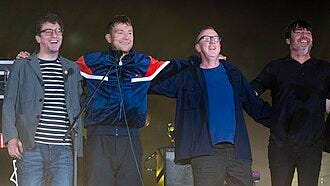 Blur at Wembley Stadium in 2023. From left to right: Graham Coxon, Damon Albarn, Dave Rowntree and Alex James