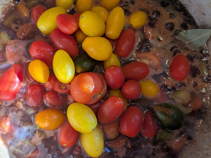 Sauce components and meat combining and coming up to a simmer.