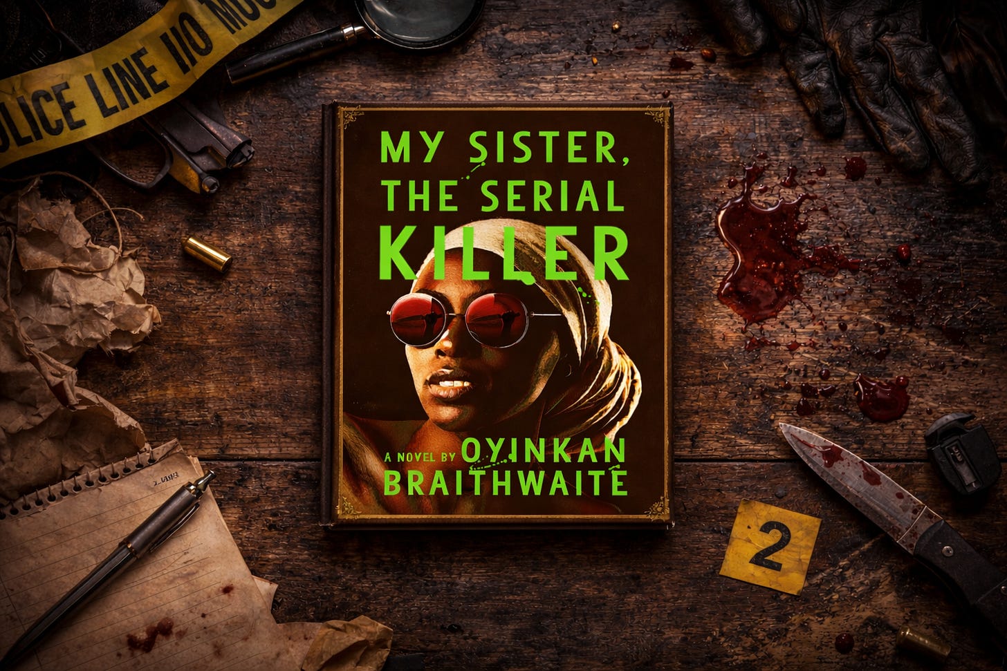 Book cover of My Sister, the Serial Killer by Oyinkan Braithwaite on a wooden table surrounded by police tape, handgun, blood stains, knife, evidence marker, and scattered papers.