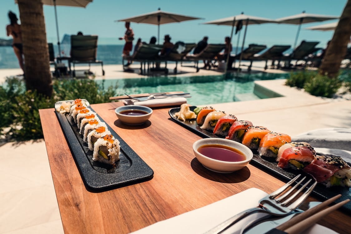 Sushi Roll on Tray and Table Sushi Roll on Tray and Table