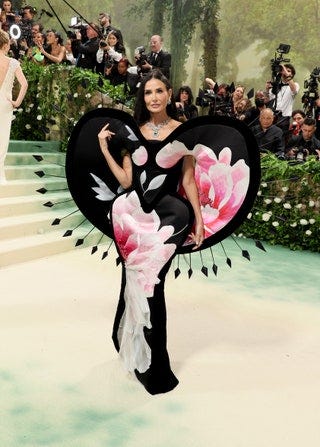 NEW YORK NEW YORK  MAY 06 Demi Moore attends The 2024 Met Gala Celebrating Sleeping Beauties Reawakening Fashion at The...