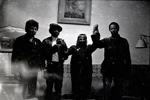 A group of people posing for a photo

Description automatically generated with medium confidence