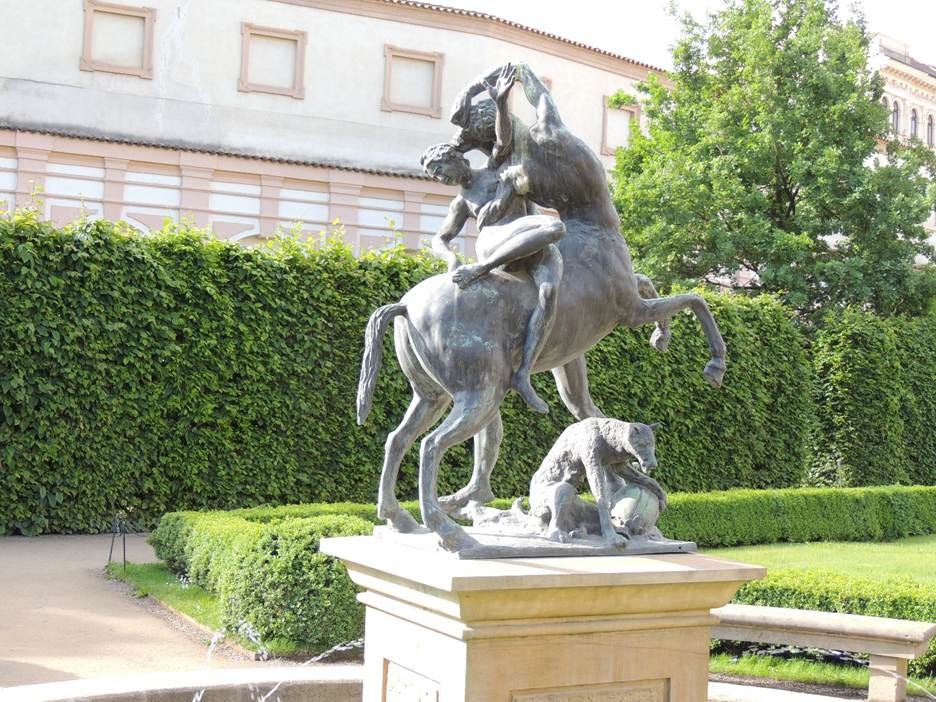 A statue of a person riding a horse

AI-generated content may be incorrect.