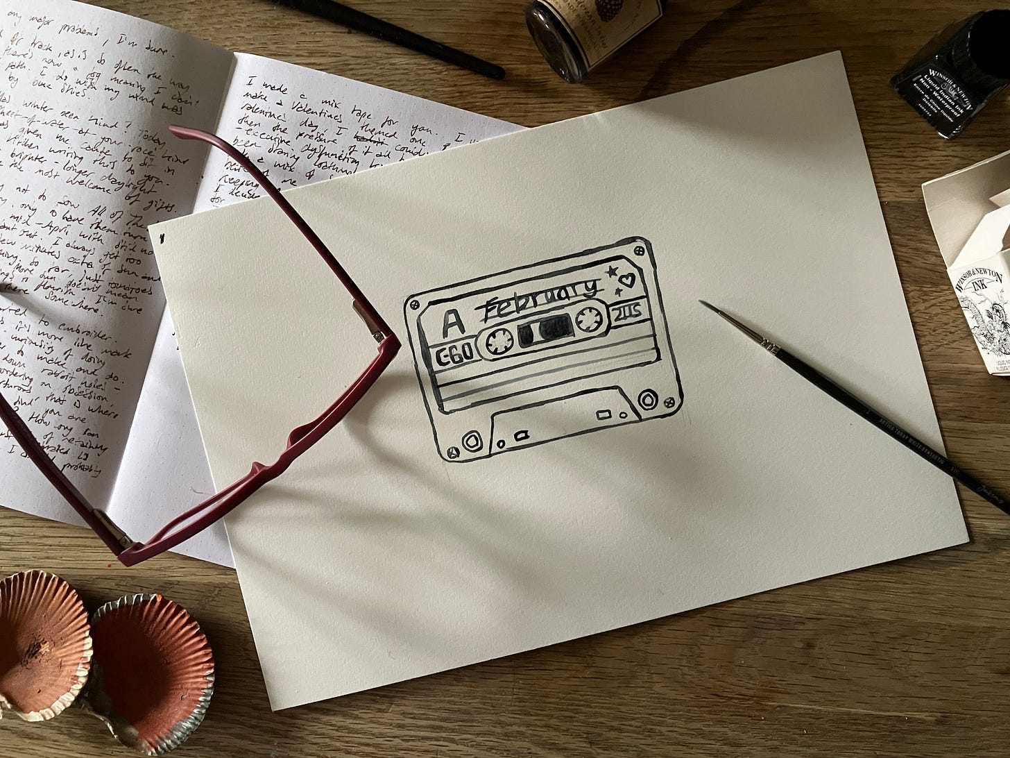 Painting of a cassette tape with the title February on it