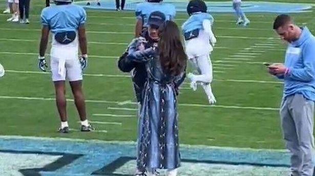 Bill Belichick's girlfriend turns heads with outfit and 'weird' actions at  UNC practice - The Mirror US