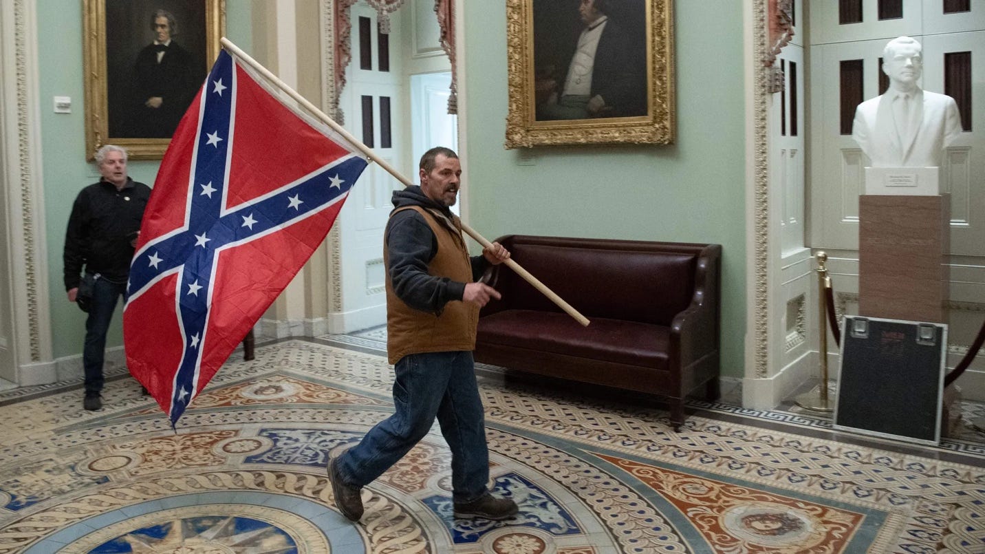 A person holding a flag

AI-generated content may be incorrect.