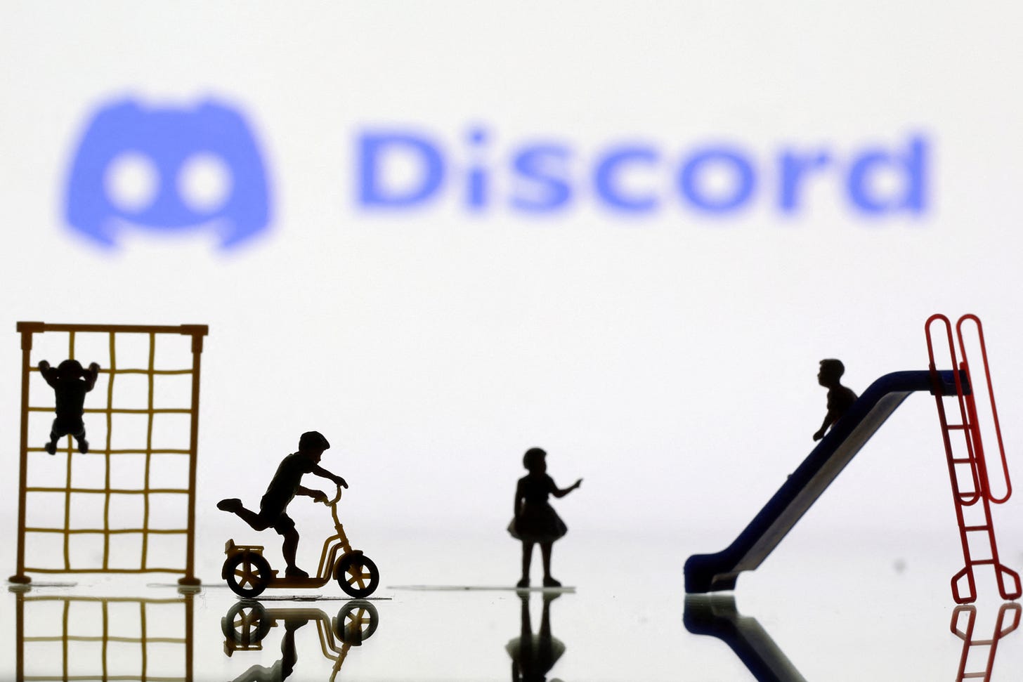 Illustration shows Discord logo Illustration shows Discord logo