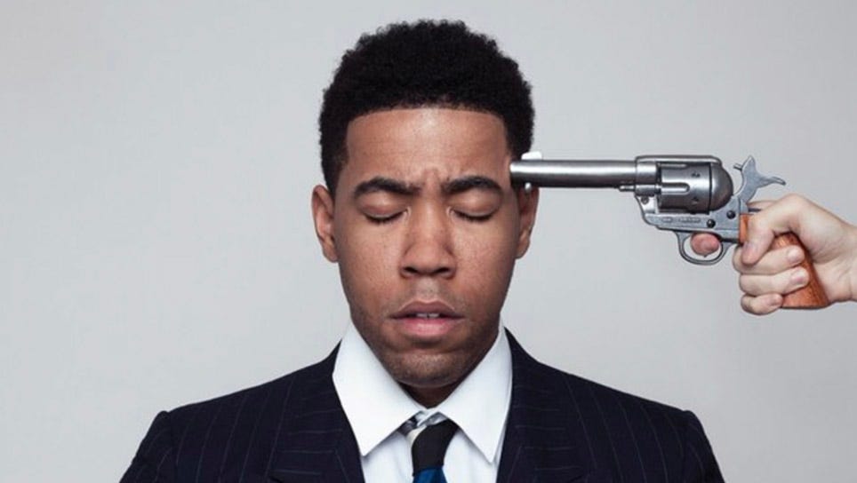 Jake from State Farm with a gun to his head