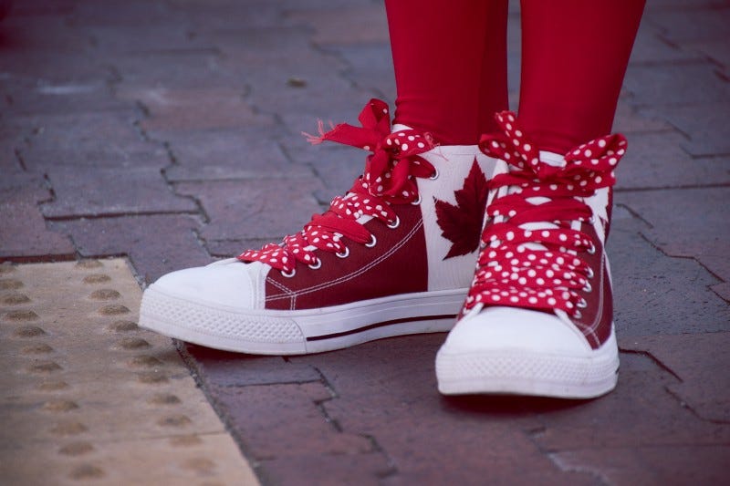 Red shoes with a Canadian flag on them. Red shoes with a Canadian flag on them.