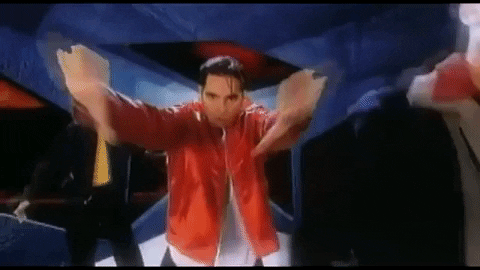 Chris is dancing between Lance and JC, and by dancing, I mean dramatically opening his arms up like some kind of magician