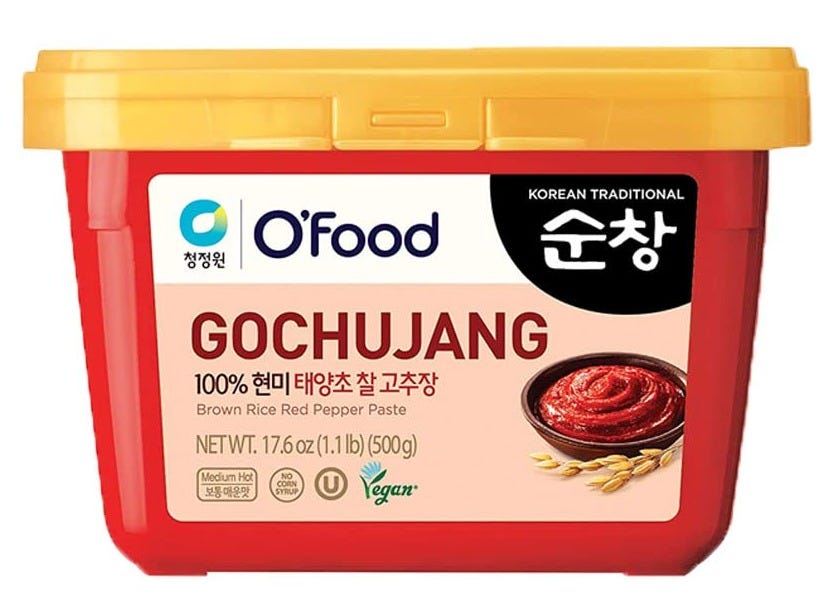 Red and yellow Ofoods tub of Gojuchang paste