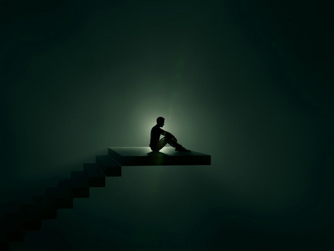 a person sitting on a bench