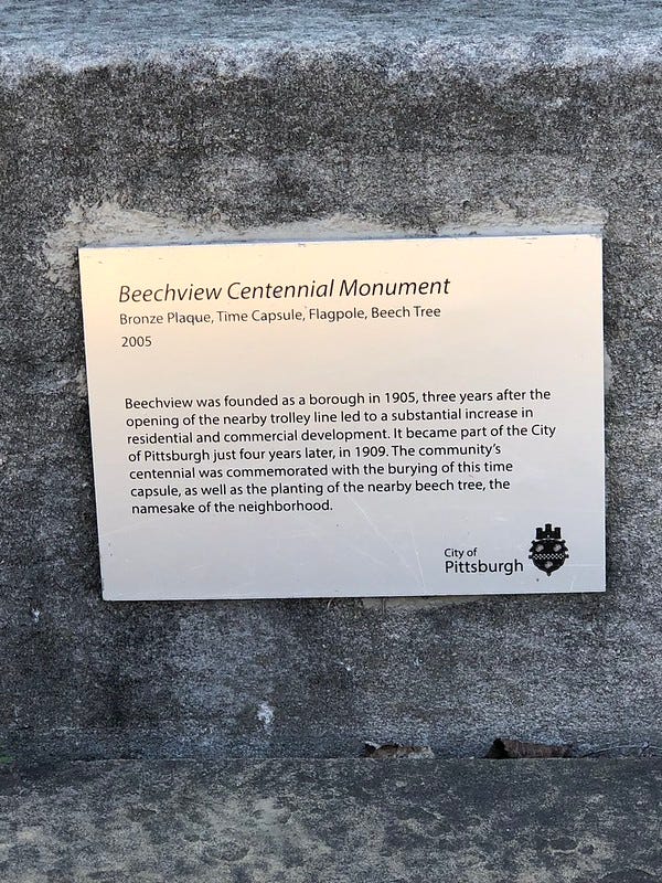 Marker explaining the 50 year time capsule installed in the park.