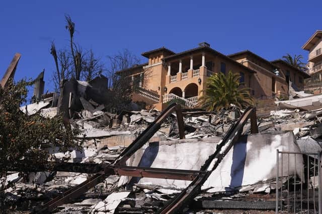 The Palisades Fire burned 23,448 acres and destroyed roughly 6,800 buildings (AP Photo/Mark J. Terrill)