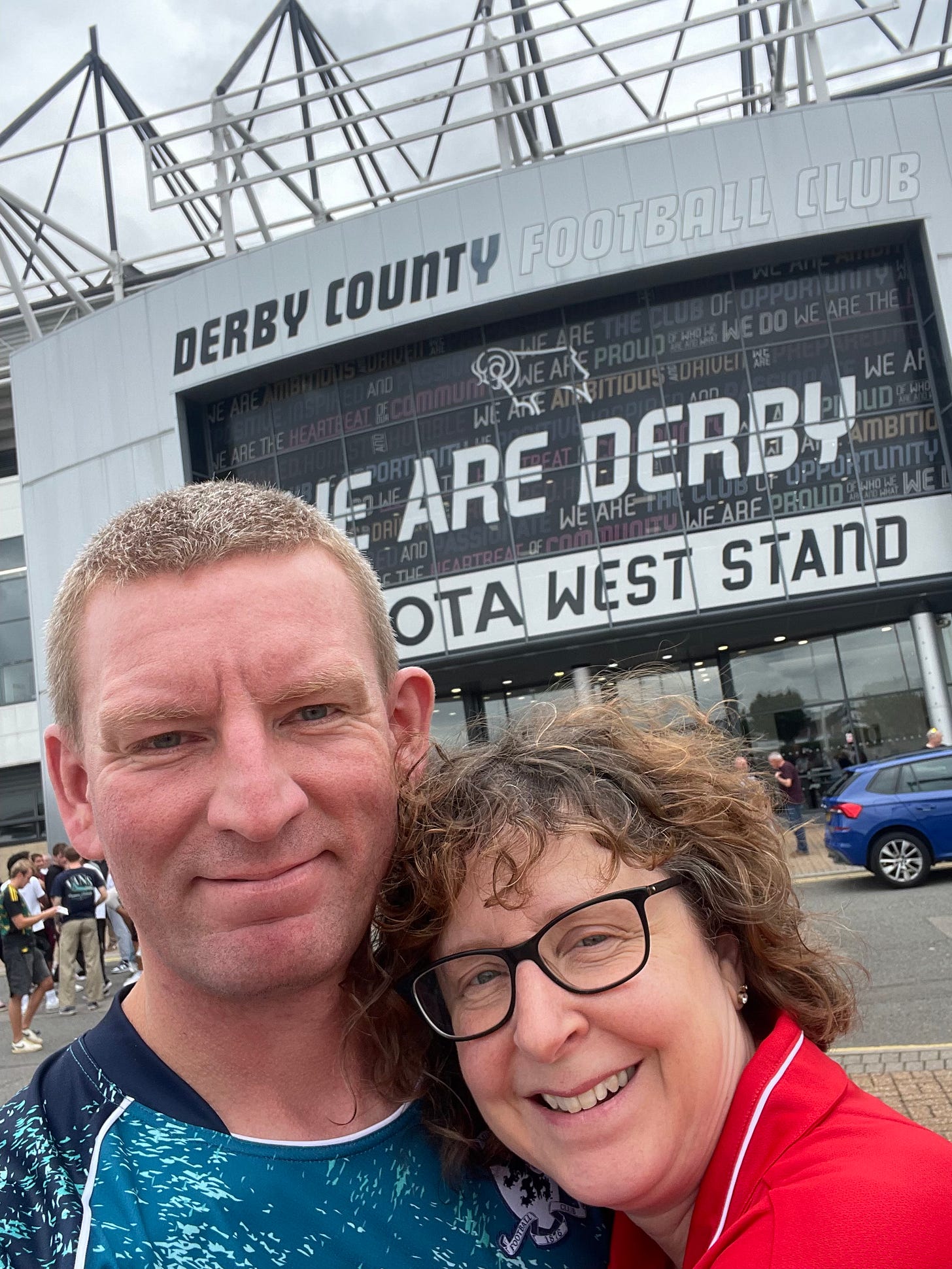 Ben and Liz standing in front of Pride Park, looking happy. This was obviously before the game.